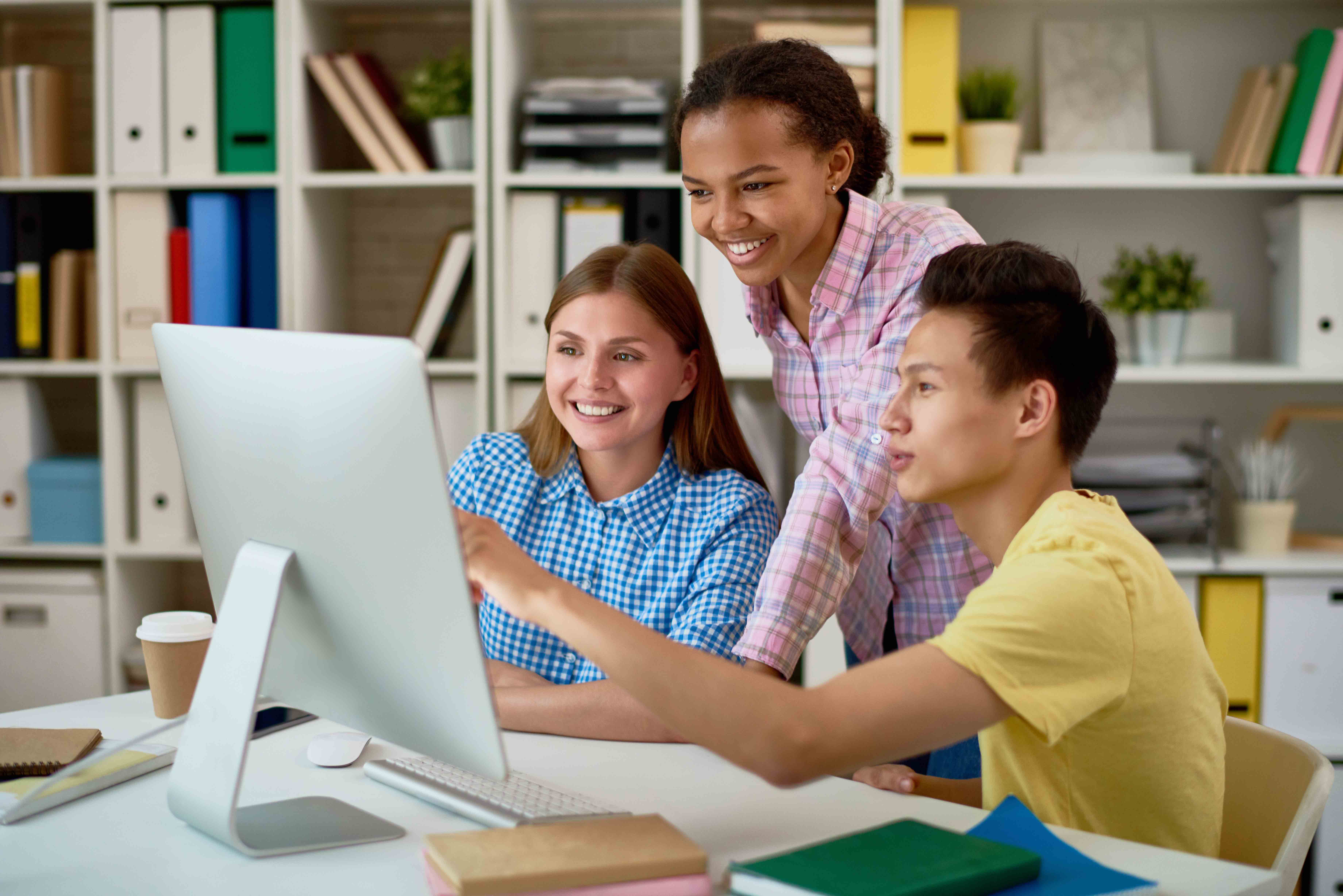 Young people learning on a computer
